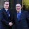 U.K. Prime Minister, David Cameron while shaking hand with Scotland's First Minister, Alex Salmond at St. Andrews House in Edinburgh